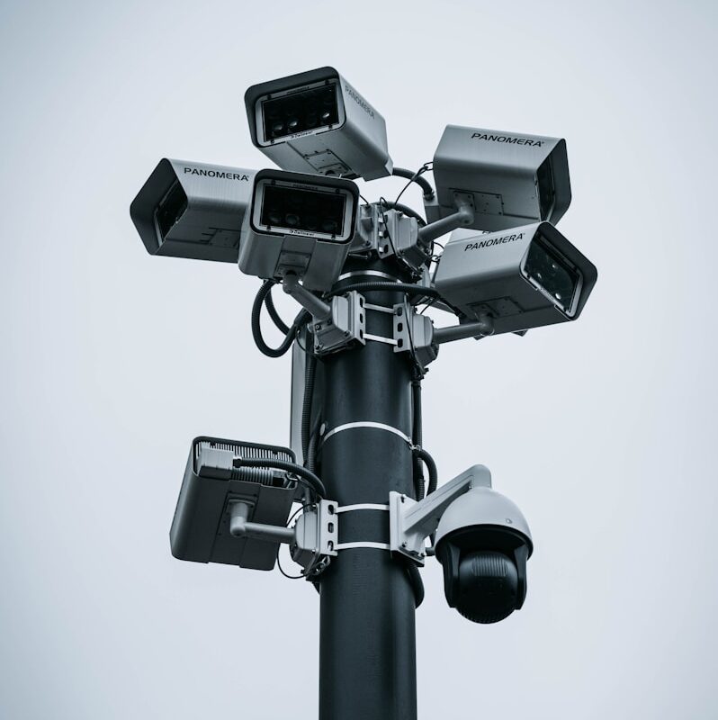 black and gray camera stand
